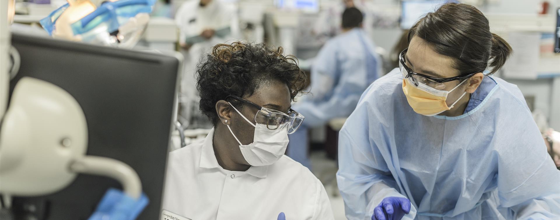 Picture of two scientists in a lab.