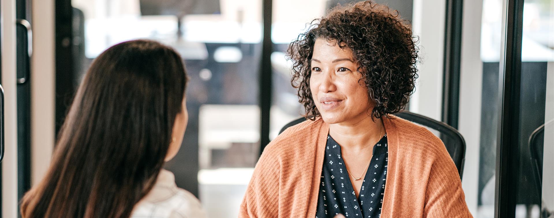 Two women discuss career path