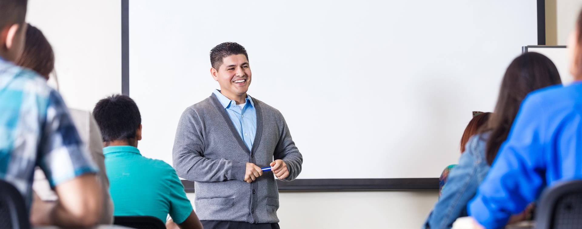 Teacher addressing students in a classroom