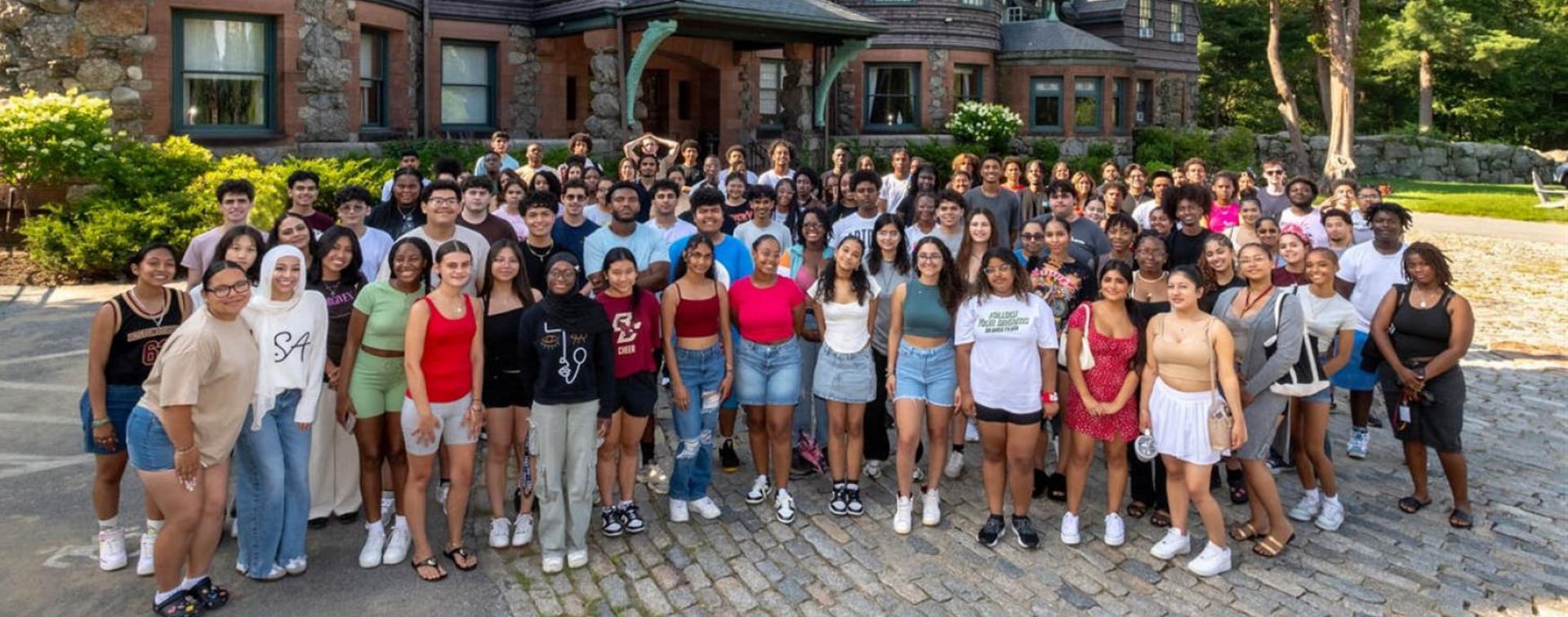 Photo of the first 110 students at Messina College gathered in front of a building on campus