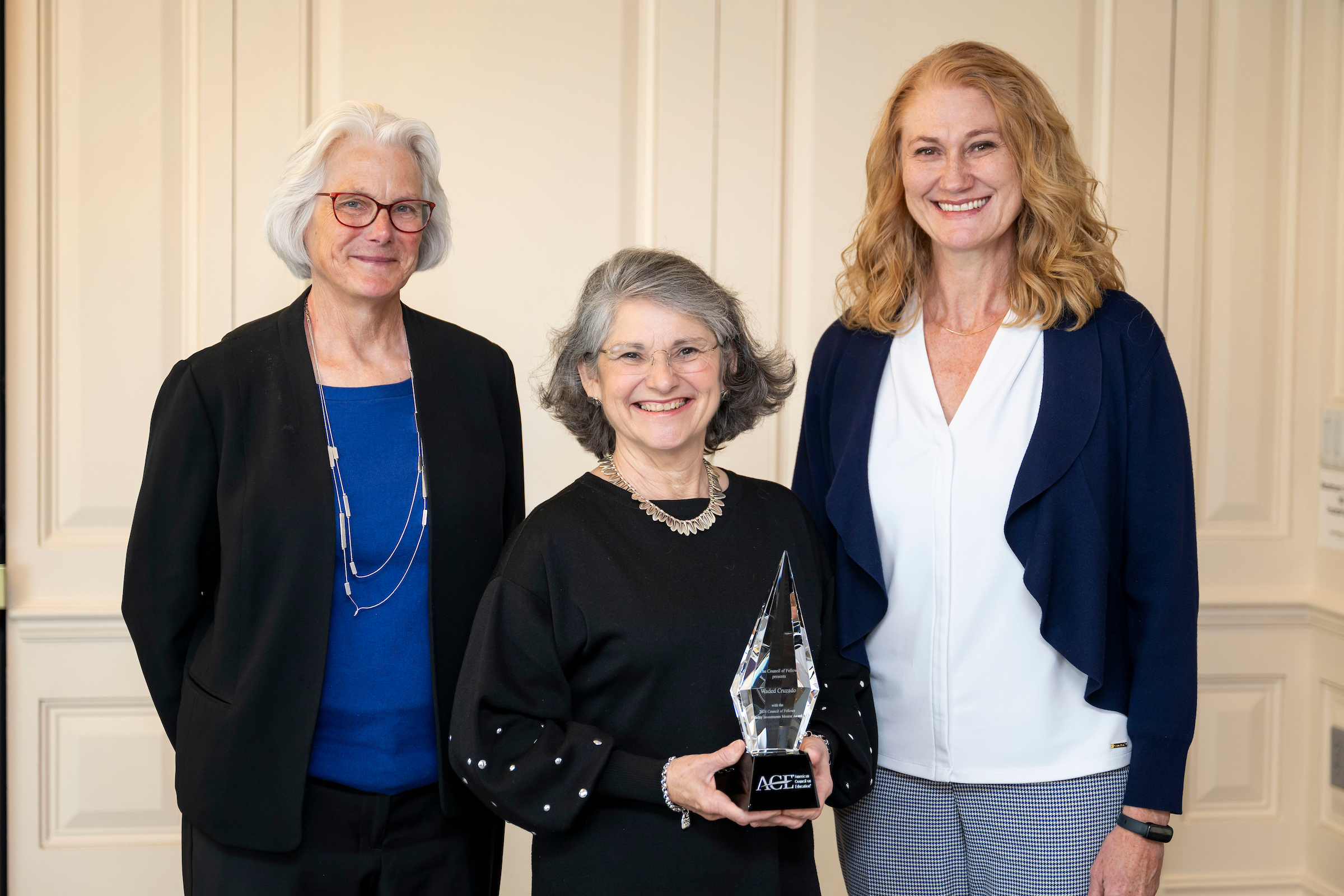 2024 Council of Fellows Mentor Award Waded Cruzado with two of her Fellows